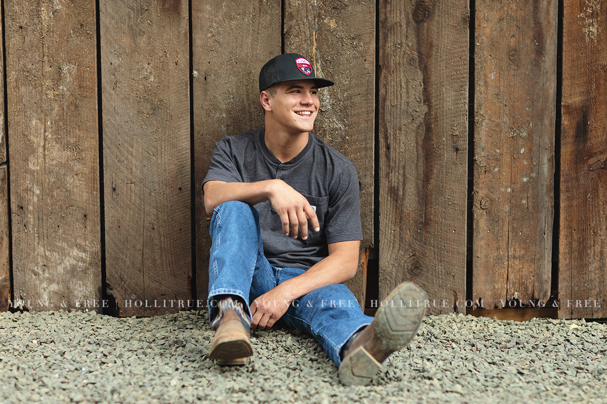 Senior Portrait of a Senior Guy at a rustic barn in Eugene, Oregon by Holli True Photography